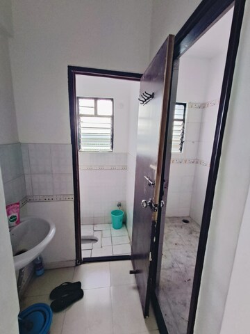 Bathroom in 1.5 BHK Apartment at Nirman Rutugandh, Nagar Road – for Rent