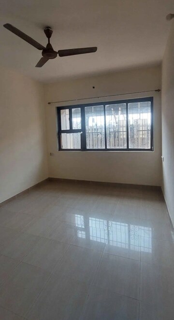 Bedroom in 1 BHK Apartment at Sonal Link Residency, Malad West – for Rent