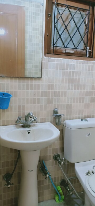 Bathroom in 2 BHK Apartment at Khirki Extension – for Rent