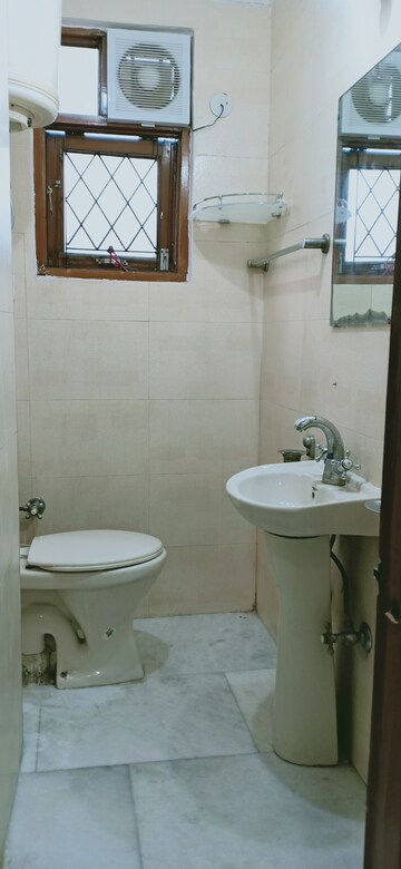 Bathroom in 2 BHK Apartment at Khirki Extension – for Rent