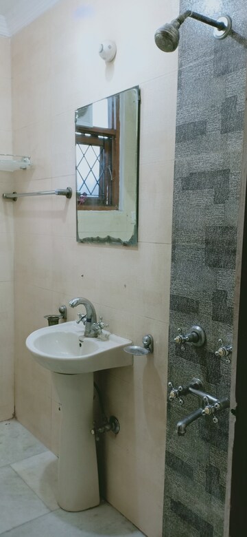 Bathroom in 2 BHK Apartment at Khirki Extension – for Rent