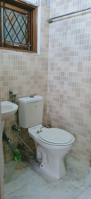 Bathroom in 2 BHK Apartment at Khirki Extension – for Rent