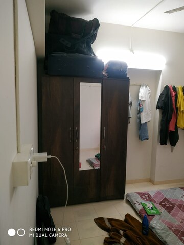 Living Room in 1 BHK Apartment at Kohinoor Riverdale, Kharadi – for Rent