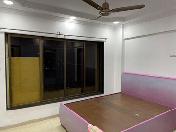 Bedroom in 2 BHK Apartment at Evershine Greens, Andheri West – for Rent