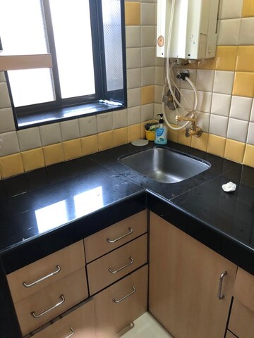 Kitchen in 1.5 BHK Apartment at MIG Colony, Worli – for Rent