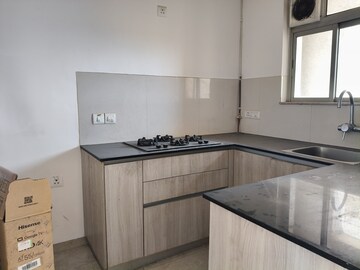 Kitchen in 1 BHK Apartment at Hiranandani Estate Solitaire C, Ghodbunder Road – for Rent