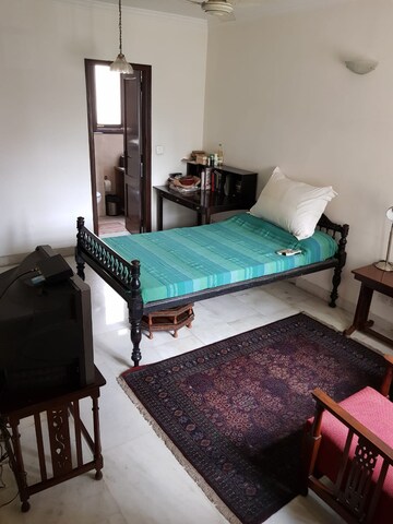 Bedroom in 4 BHK Apartment at Greater Kailash I – for Rent