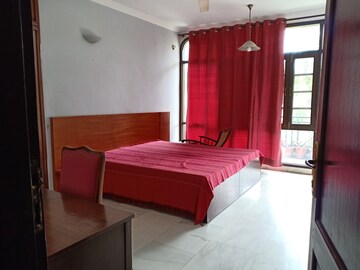 Bedroom in 4 BHK Apartment at Greater Kailash I – for Rent