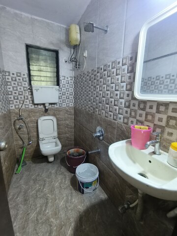 Bathroom in 3 BHK Builder Floor at Chahak Plaza, Shakti Khand – for Rent