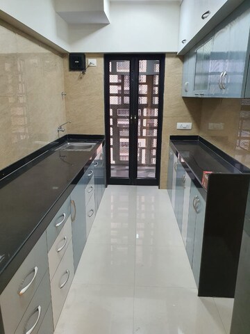 Kitchen in 2 BHK Apartment at Hubtown Hill Crest, Andheri East – for Rent