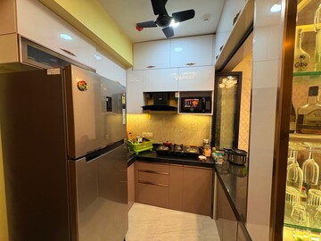 Kitchen in 1 BHK Apartment at Lodha Crown Quality Homes, Majiwada – for Rent