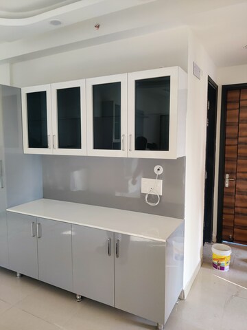 Kitchen in 3 BHK Apartment at Samridhi Luxuriya Avenue, Sector 150 – for Rent