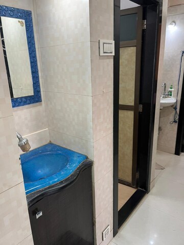Bathroom in 1 BHK Apartment at Mantri Park, Goregaon East – for Rent