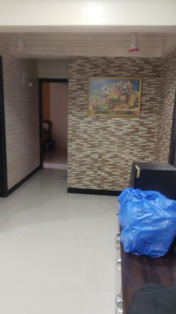 Room in 2 BHK Apartment at Kshitij CHS, Goregaon East – for Rent