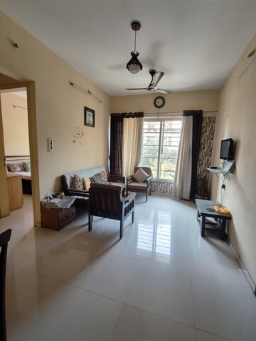 Living Room in 2 BHK Apartment at Vasant Fiona, Pokhran Road No 2 – for Rent