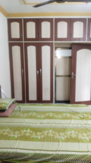 Bedroom in 2 BHK Apartment at Kshitij CHS, Goregaon East – for Rent