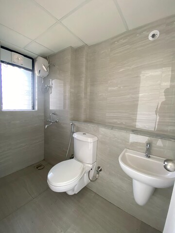 Bathroom in 1 BHK Apartment at Runwal Gardens, Dombivli East – for Rent