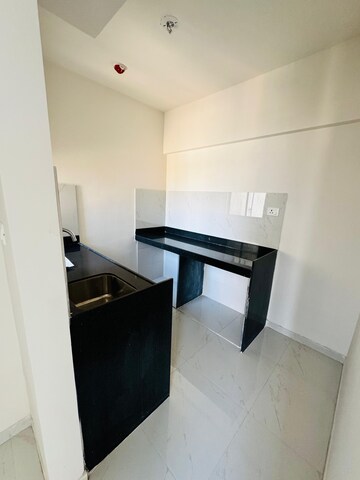 Kitchen in 1 BHK Apartment at Runwal Gardens, Dombivli East – for Rent