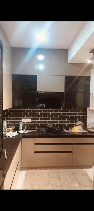 Kitchen in 3 BHK Apartment at Prateek Grand Paeonia, Krishna Vihar – for Rent