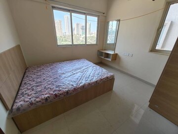 Bedroom in 2 BHK Apartment at Omkar Signet, Malad East – for Rent