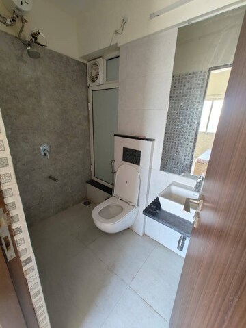 Bathroom in 2 BHK Apartment at Omkar Signet, Malad East – for Rent