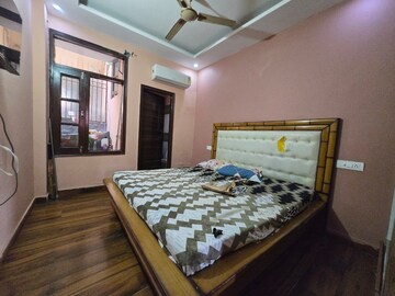 Bedroom in 3 BHK Builder Floor at Guru Nanak Enclave, Dhakoli Village – for Rent
