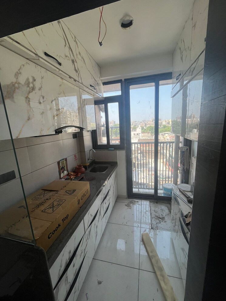 Kitchen, abhay-ratna-shashwat 1.5 Bedroom 801 Sq.Ft. Apartment In Chandlodia Ahmedabad 8251122