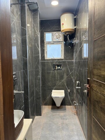 Bathroom in 1 BHK Apartment at Chattarpur – for Sale