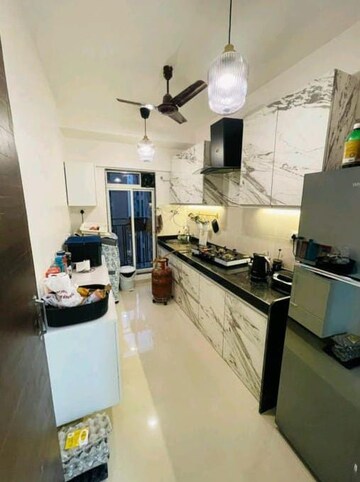 Kitchen in 2 BHK Apartment at Bini Winspace Amelio, Andheri West – for Rent