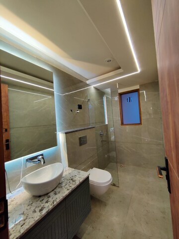 Bathroom in 3 BHK Apartment at Chattarpur – for Sale