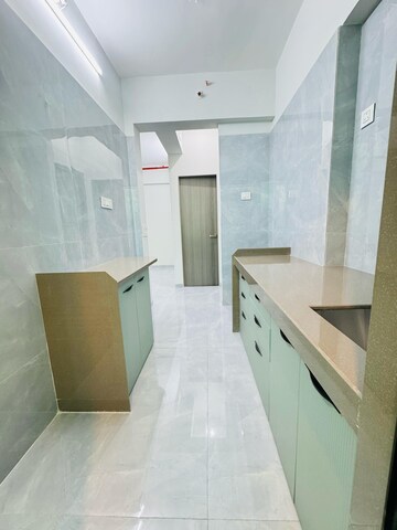 Kitchen in 2 BHK Apartment at Unique Estate, Mira Road – for Sale