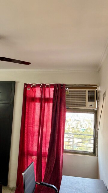 Bedroom in 3.5 BHK Apartment at Aims Golf City, Sector 75 – for Rent