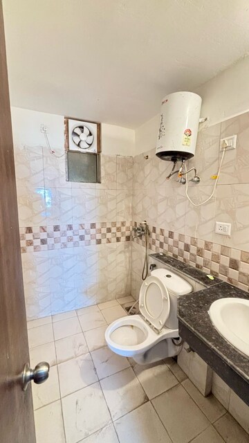 Master Bedroom in 3.5 BHK Apartment at Aims Golf City, Sector 75 – for Rent