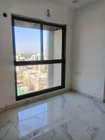 Room in 2 BHK Apartment at Dev Leo Tower, Oshiwara – for Rent