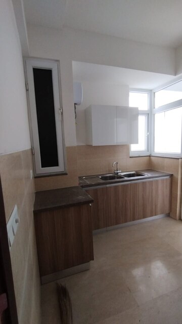 Kitchen in 3 BHK Apartment at Signature Global De Luxe DXP, Sector 37d – for Sale