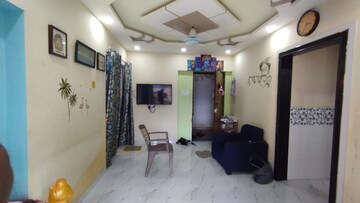 Living Room in 1 BHK Apartment at Royal Palms, Goregaon East – for Rent