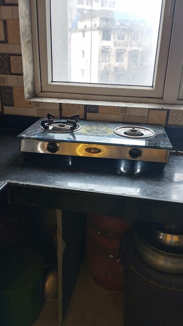 Kitchen in 1 BHK Apartment at Royal Palms, Goregaon East – for Rent
