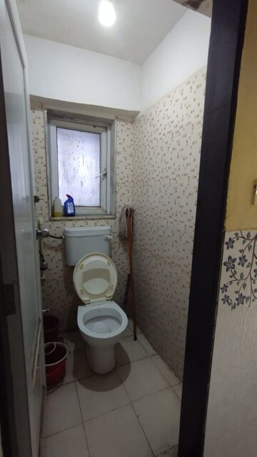Bathroom in 1 BHK Apartment at Royal Palms, Goregaon East – for Rent