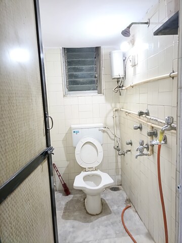 Bathroom in 2 BHK Apartment at Tapovan CHS, Goregaon East – for Rent