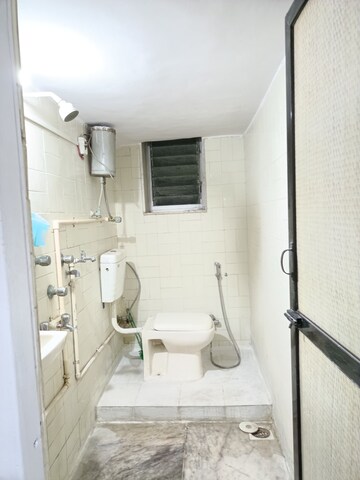 Bathroom in 2 BHK Apartment at Tapovan CHS, Goregaon East – for Rent