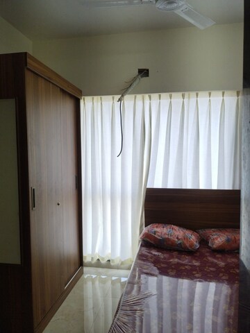 Bedroom in 1 BHK Apartment at Sethia Imperial Avenue, Malad East – for Rent