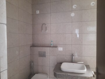 Bathroom in 3 BHK Apartment at Adore Samriddhi, Sector 89 – for Sale