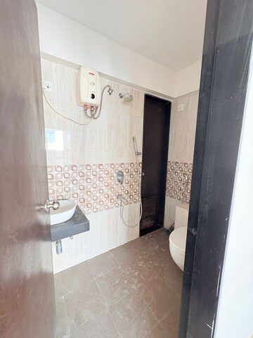 Bathroom in 2 BHK Apartment at The Baya Goldspot, Andheri East – for Rent