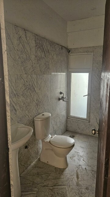 Bathroom in 3 BHK Apartment at Prateek Grand City, Siddharth Vihar – for Rent