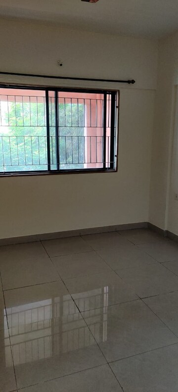 Living Room in 1 BHK Apartment at Magarpatta City Heliconia, Hadapsar – for Rent