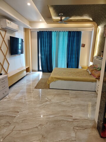 Living Room in 4 BHK Apartment at Ansal API Esencia, Sector 67 – for Rent