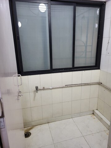 Bathroom in 2 BHK Apartment at Rushi The Kollage, Andheri East – for Rent