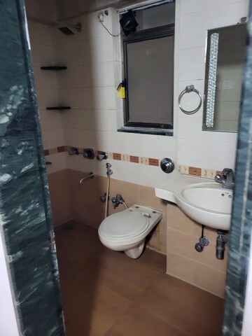Bathroom in 2 BHK Apartment at Rushi The Kollage, Andheri East – for Rent
