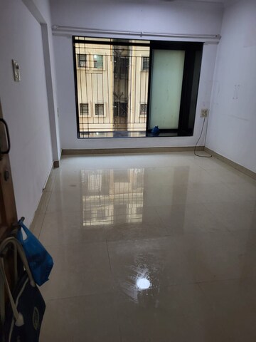 Room in 2 BHK Apartment at Rushi The Kollage, Andheri East – for Rent