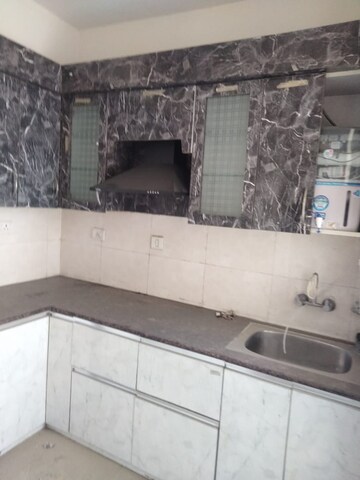 Kitchen in 2 BHK Apartment at Proview Officer City 2, Raj Nagar Extension – for Rent